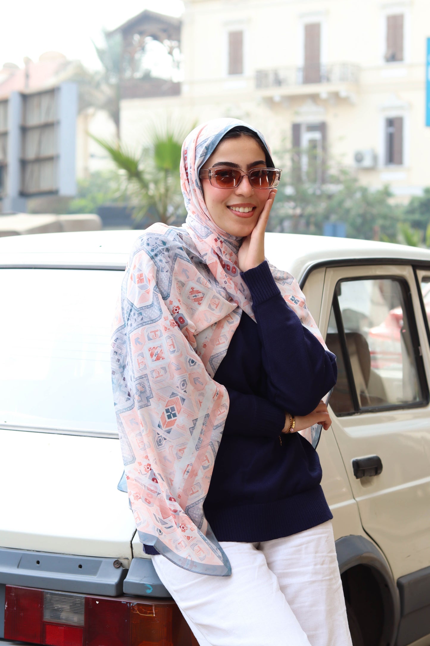 Lina in dark blue pullover and Tia in blue chiffon scarf